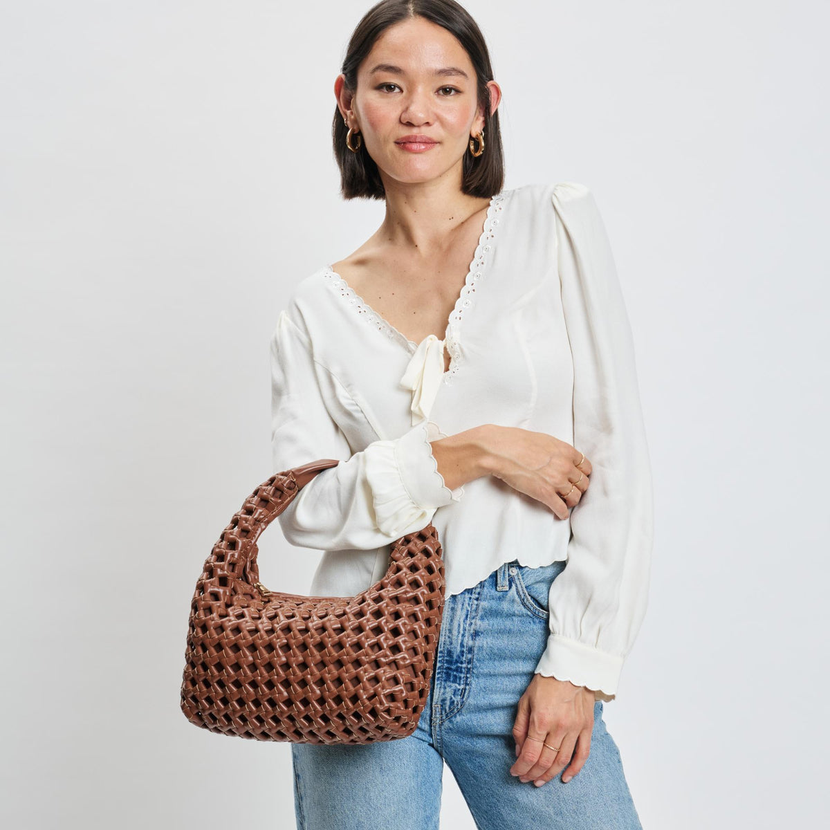 Woman wearing Chocolate Moda Luxe Richelle Hobo 842017137542 View 1 | Chocolate