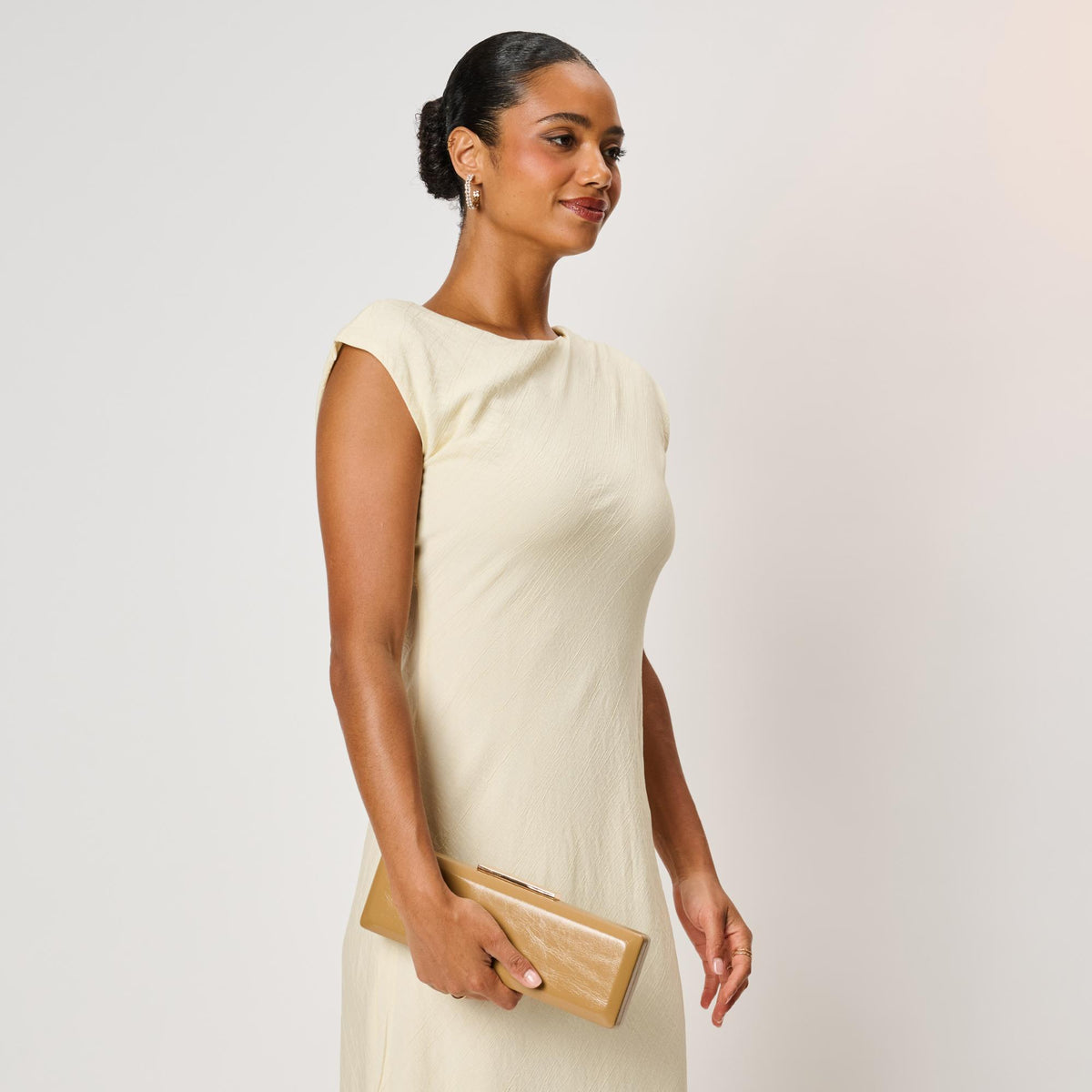 Woman wearing Camel Moda Luxe Angie Clutch 842017142492 View 2 | Camel