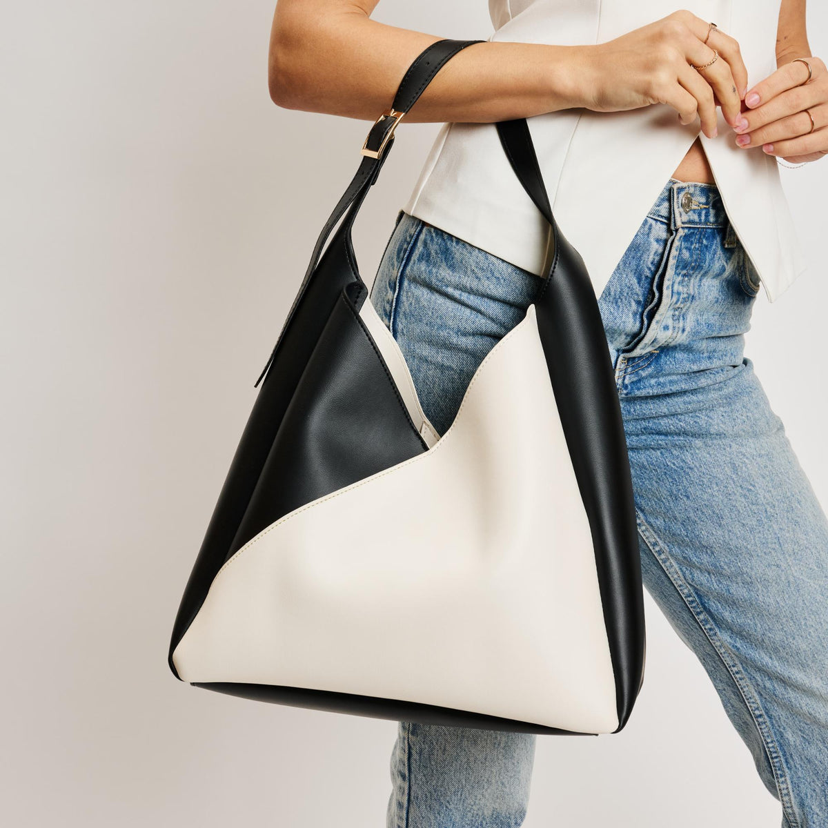 Woman wearing Ivory Black Sol and Selene Frankie Hobo 842017138518 View 1 | Ivory Black
