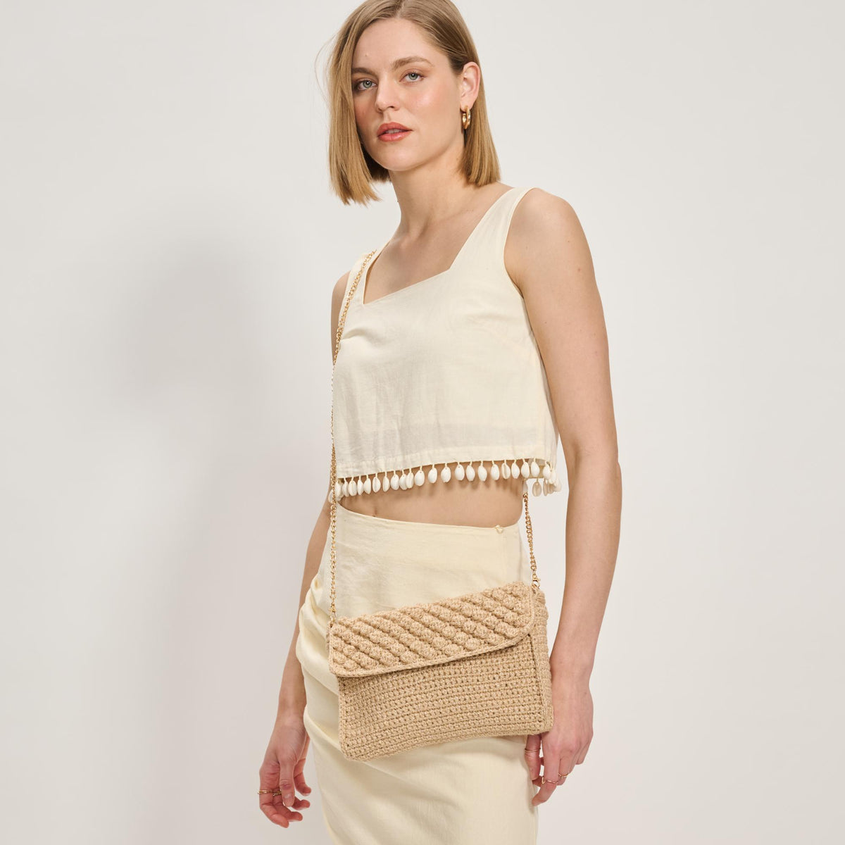 Woman wearing Natural Moda Luxe Celeste Crossbody 842017137818 View 2 | Natural