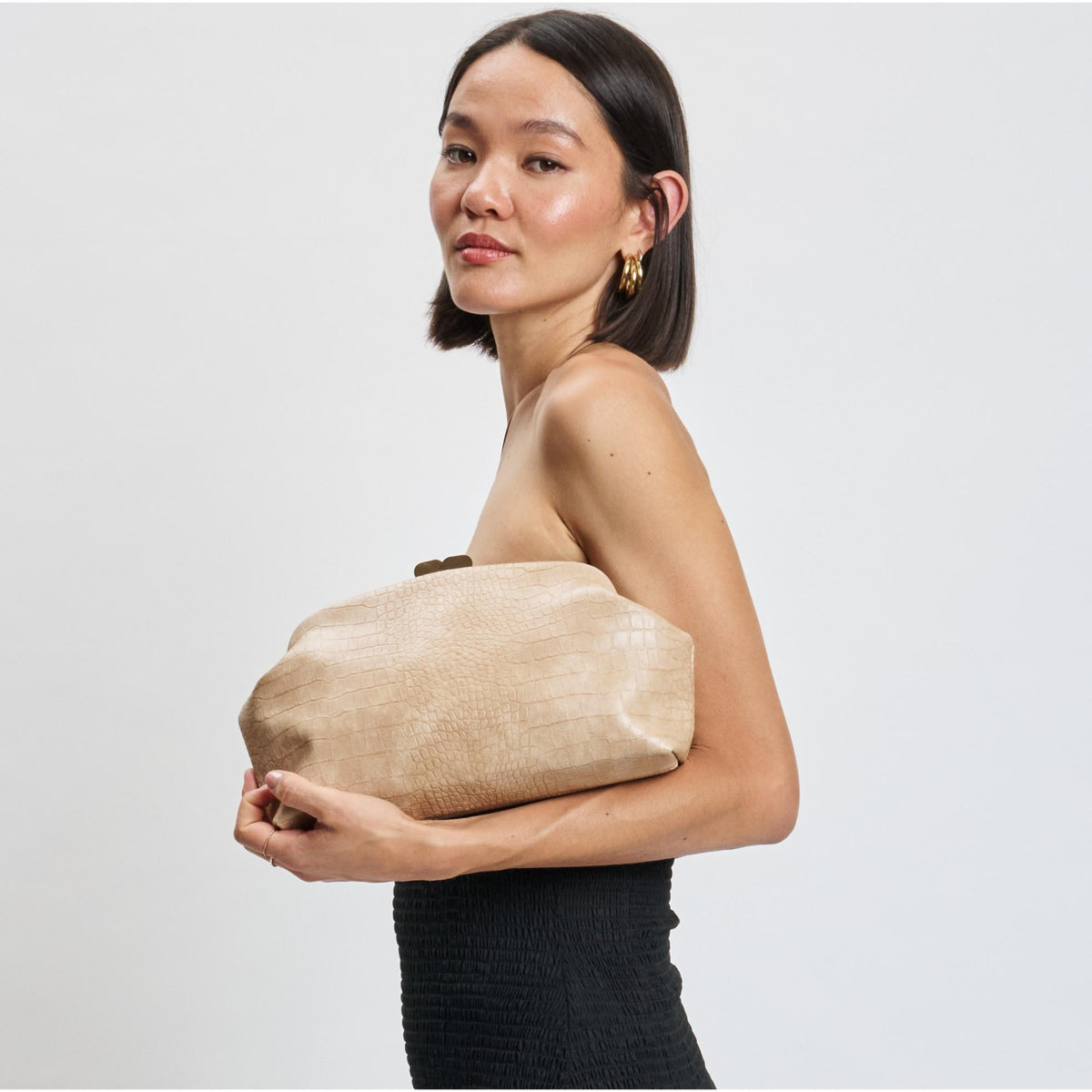 Woman wearing Natural Moda Luxe Camille Clutch 842017139171 View 1 | Natural